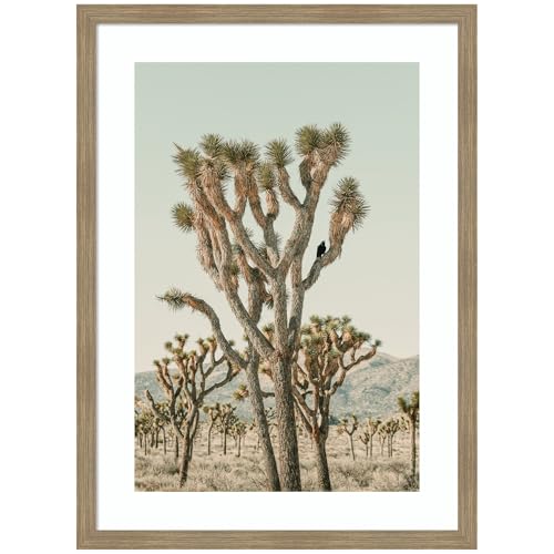 Kate and Laurel Framed Wall Art Print Joshua Tree With Crow by Alicia Bock, 25 x 34, Woodgrain Stripe Mocha Frame, Rustic Farmhouse, Landscape Art for Wall Decor by Kate and Laurel - Used condition - US$155.91