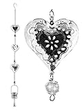 Trois accrocher des boules de verre, porte-bougie en métal et un bruit faisant de Dong ci-dessous