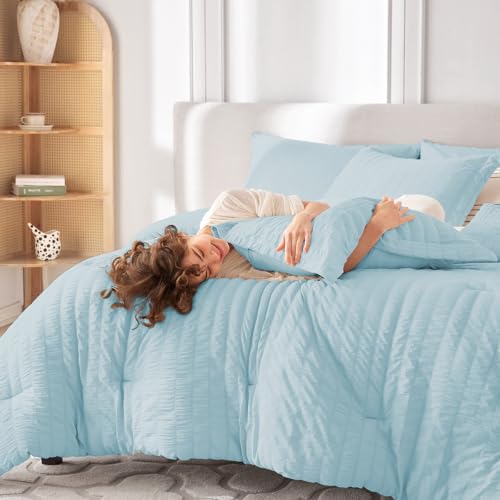Image of MUXHOMO 7 Pieces Oversized Queen Comforter Set, Seersucker Bed in a Bag Oversized Queen Size, All Season Luxury Bedding Set with Comforter, Flat Sheet, Fitted Sheet, Pillowcases & Shams, Lake Blue