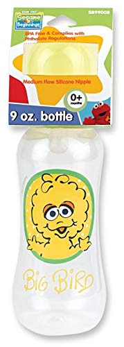 Sesame Beginnings Bottle Bank Gift Set - 8 Piece Baby kit Includes 9 oz Baby Bottle, bib, Bottle Brush, Snack Container with lid, Brush and Comb All in Large Bottle Bank - Big Bird Yellow