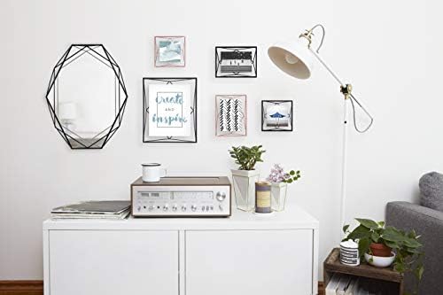 UMBRA Prisma Mirror. Prisma wall mirror on black metal structure. Dimensions 56.5x42.5x8.3 cm