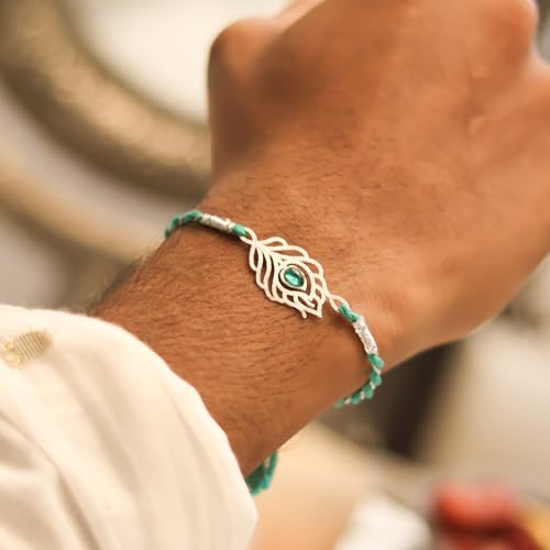 Image of 925 Sterling Silver Peacock Feather with Green Stone Rakhi for Bhai Cotton Thread | Rakshabandhan Rakhi With Greeting Card & Roli Chawal and Certificate of Authenticity