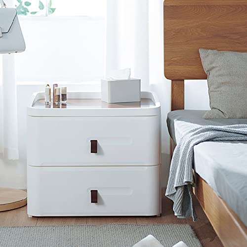 Meuble de chambre haut de gamme blanc au fini mat avec tiroirs de rangement et plateau