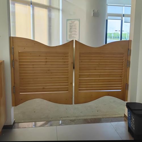 Porte à fermeture automatique en bois pour séparer le salon