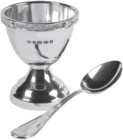 Sterling Silver egg cup and spoon with pretty celtic design. Perfect gift for a new baby or christening. Complete with presentation case.