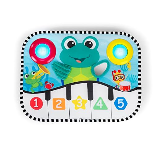 Baby Einstein Ocean Explorers Cojín Musical Pataditas y Explorar y Juguete para Cuna Neptune, a partir del recién nacido