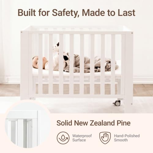 Image of MAMAZING EvoNest 6-in-1 Convertible Baby Mini Crib with Wheels | GREENGUARD Gold Certified, New Zealand Pine Wood, 4 Adjustable Heights, Rocking Mode, Small Spaces Design, White
