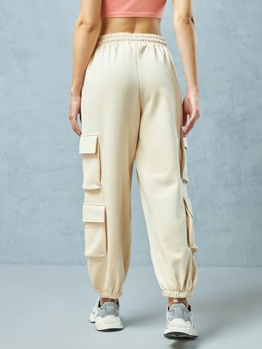 Image of Bewakoof Women's Fleece Super Loose Fit Joggers|Bewakoof Heavy Duty 1.0 | Track pants for woman | Lower for women | Multipurpose | Activewear | Utility Pockets | Lightweight & Flexible Elastic Waist | Casual Joggers | Loose Fit