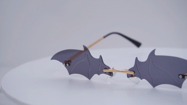 Amazon.com: Azoxus Vintage Bat Sunglasses Rimless Futuristic