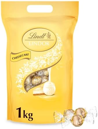 Lindt Schokolade | LINDOR Kugeln Cheesecake, 1kg Beutel, Großpackung | ca. 78 Kugeln, Weiße Schokolade, Quark-Füllung, Gebäckstückchen, zum Teilen, zartschmelzend, Käsekuchen, Vorr