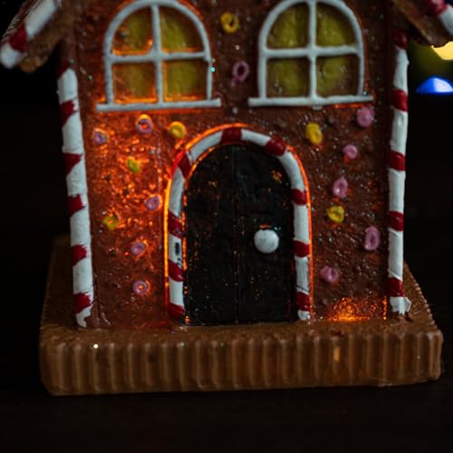Estatua de pueblo de Navidad y casa de jengibre de resina 8