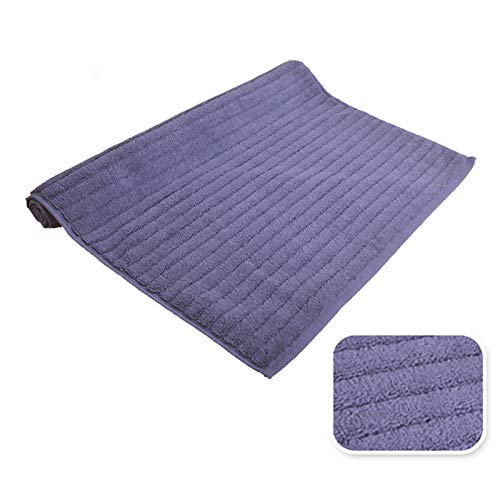 Tapis de bain absorbant bleu contre le carrelage glissant de la douche et cuisine
