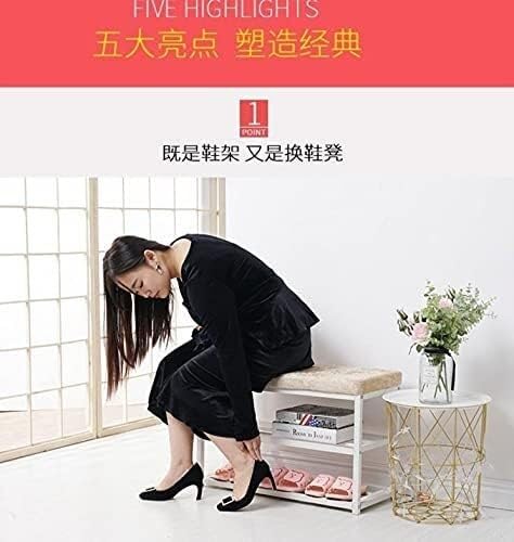 Étagère à chaussures en cuir noir pour une entrée de maison ordonnée