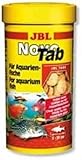 Optimales Protein-Fettverhältnis für gesunde Fische: Ideale Ernährungsbedingungen für Fischarten von 3 bis 20 cm Größe aller Wasserschichten An der Aquarienscheibe haftende Futtertablette, Fische können beim Fressen beobachtet werden