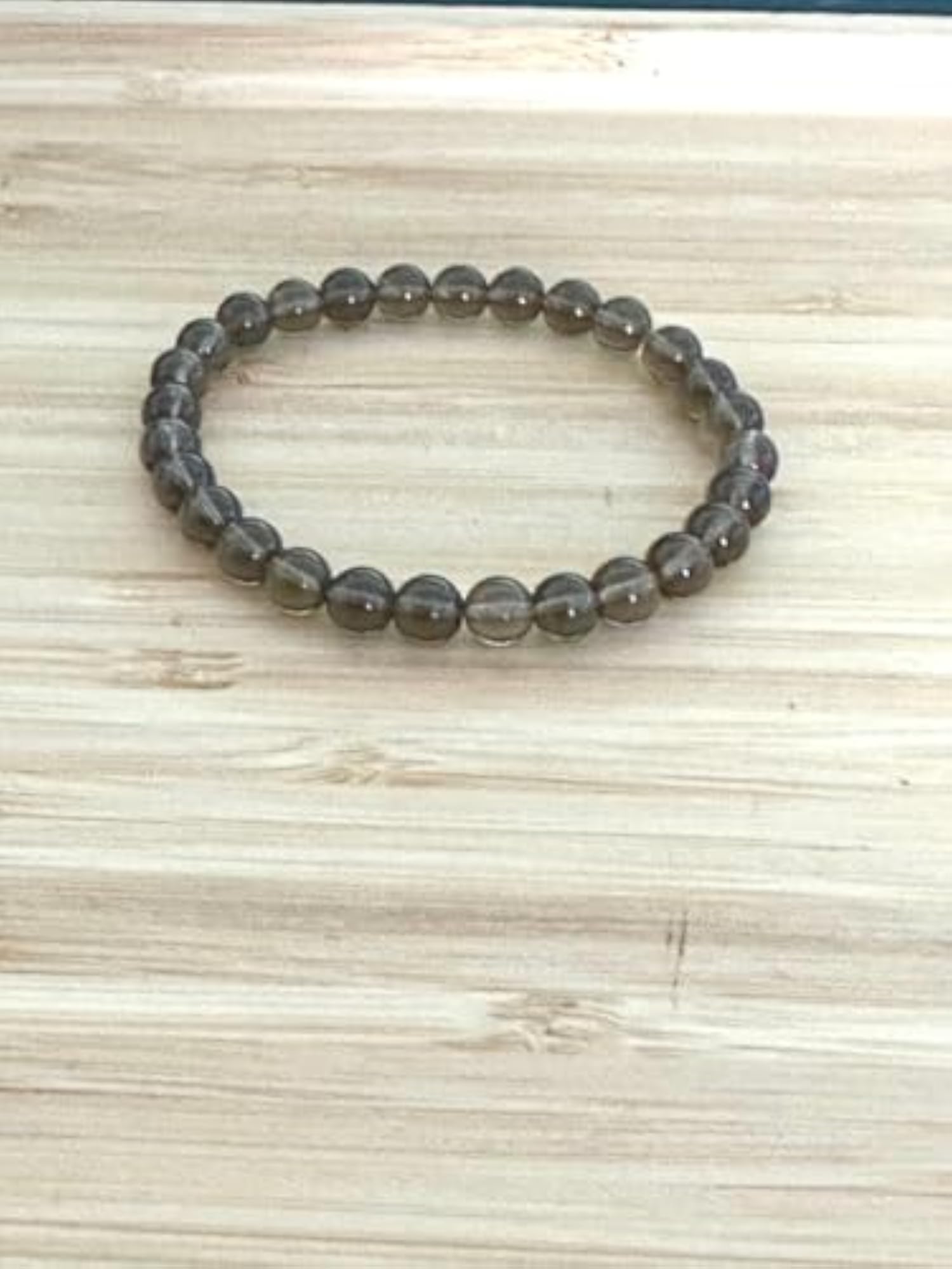 Natural Smoky Quartz 7 Inch Round Bead Stretchable Bracelet, Unisex