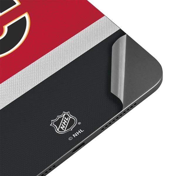 Skinit Decal Tablet Skin Compatible with iPad Mini 7 (2025) - Officially Licensed NHL Calgary Flames Jersey Design
