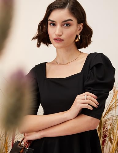 Image of Amazon Brand - Eden & Ivy Women Solid Crepe Square Neck Puff Sleeve Regular Fit Peplum Knit Top (Available in Plus Sizes)
