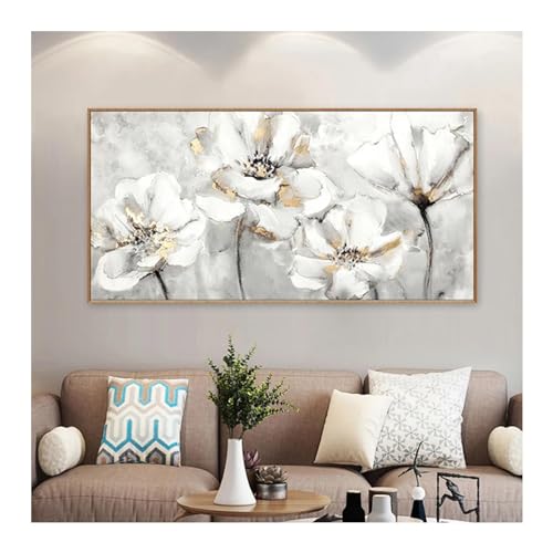 Pintura abstracta de flores en oro y blanco para decorar un salón de estilo nórdico