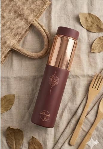 Image of Nirva Designer Pure Copper Water Bottle 1 Litre - Matte Finish, Sacred Om Mantra Engraving, Leak-Proof Cap, Supports Ayurvedic Wellness, Ideal for Yoga, Fitness & Daily Use