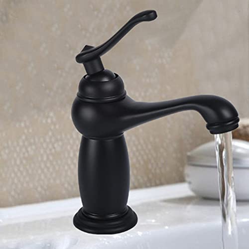 Robinet de salle de bain noir et laiton pour une vasque rétro