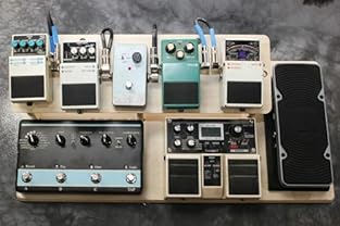 Fits up to 12 Standard Size Pedals Includes 2 Feet of 2" Adhesive Backed Hook and Loop Strips Simple Assembly - Wood Glue not Included CNC Made from 1/2" Baltic Birch Plywood Made with pride in the USA