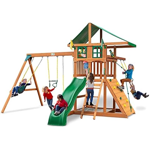 Gorilla Playsets 01-1080 Avalon Treehouse Wooden Swing Set with Oversized Green Vinyl Canopy Roof, Trapeze Arm, Climbing Wall, Ladder, Swings and Slide Cover