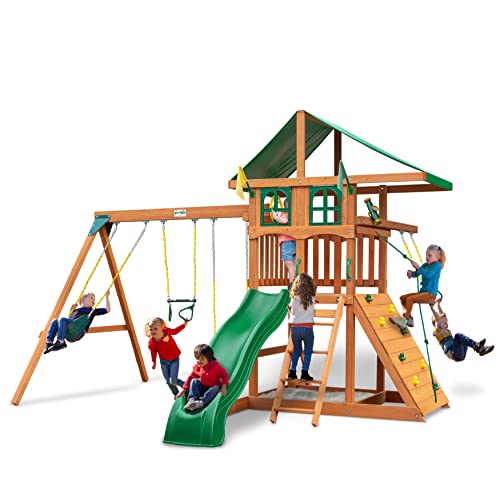 Gorilla Playsets 01-1080 Avalon Treehouse Wooden Swing Set with Oversized Green Vinyl Canopy Roof, Trapeze Arm, Climbing Wall, Ladder, Swings and Slide