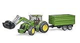 Kombination aus einem John Deere 7930 Traktor mit Frontlader und einem Tandemachs - Transportanhänger