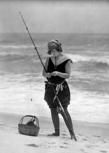 Holy Mackerel girl fishing on the beach retro black and white photographic card featuring a vintage image of a young woman preparing rod and bait for a cast - 12.6 x 17.7cm and blank inside