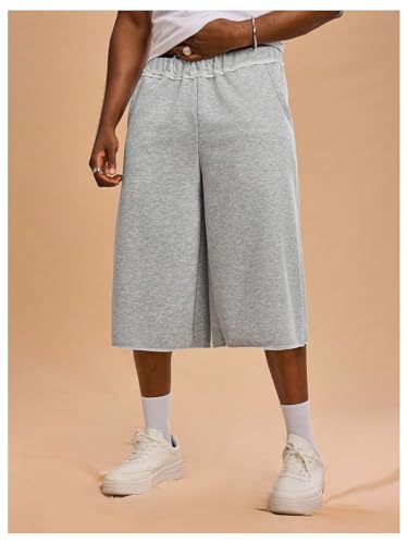 OYOANGLE Men's Capri Sweat Shorts Hip Hop Solid Below Knee Loose Athletic Shorts with Pockets3