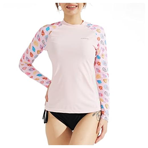 SURFEASY Camiseta de natación para Mujer, de Secado rápido, de Manga Larga, protección Solar, Surf Rashguard, Conchas Rosa, XXL