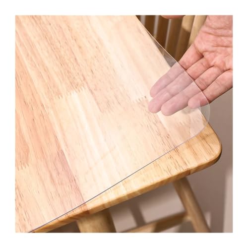 Nappe transparente anti-tache en PVC pour protéger une table en bois