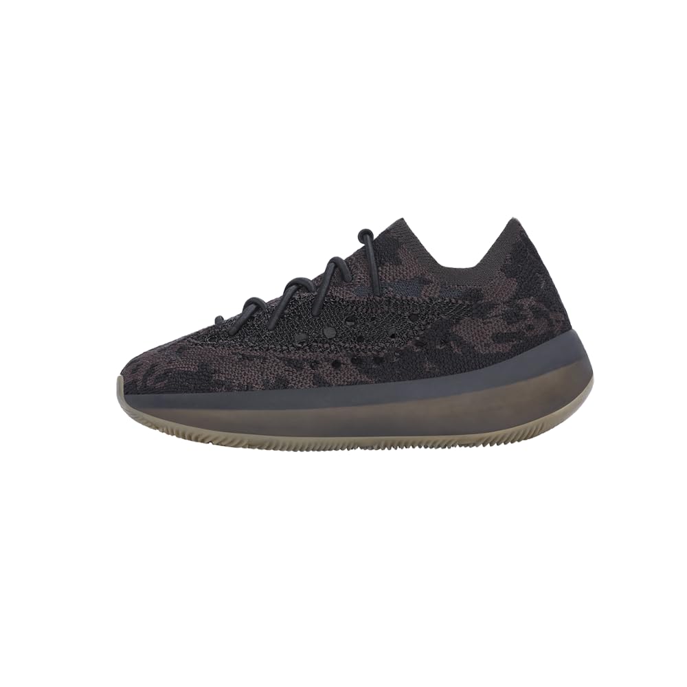 PUMA Caven Sneaker, Black Black-Gold, 4 US Unisex Big Kid