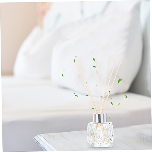 Set decorativo con botellas de aromaterapia y varillas de ratán miniatura 3