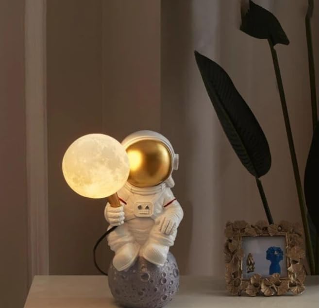 Image of Lunar Astronaut Resin Bedside Table Lamp for Kids' Room Desk Lamp- Warm White (Bulb Included)|Rest Pose