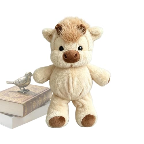 Vache en peluche courant pour apporter de la tendresse au lit