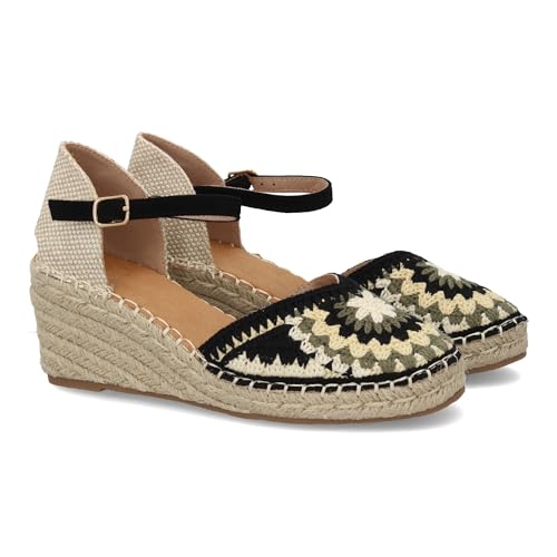 Espadrille compensée avec tige tressée et finitions soignées