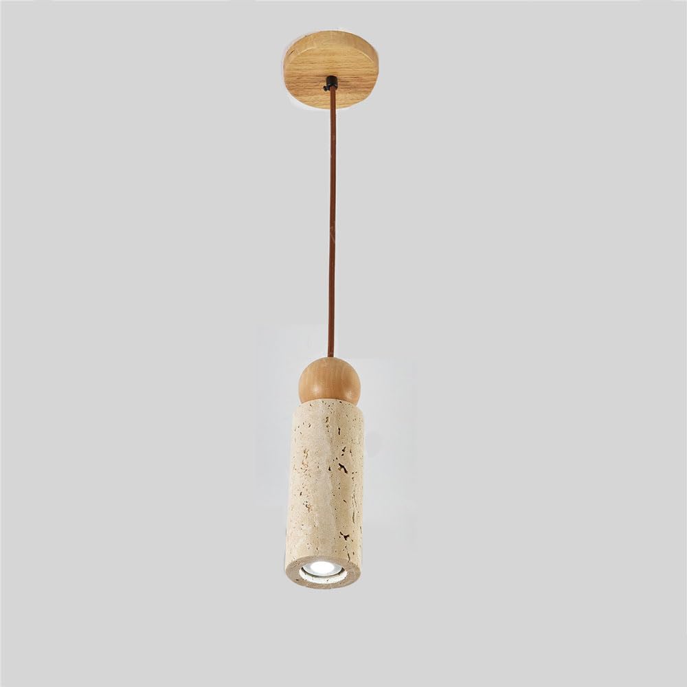 Isla de cocina iluminada con lámpara colgante lineal rústica de tira larga en travertino