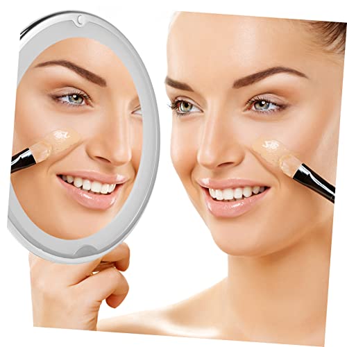 Miroir de maquillage grossissant 7X fini les manques de lumière - 7