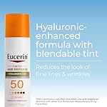Eucerin Sun Tinted Age Defense SPF 50 Face Sunscreen Lotion with Hyaluronic Acid, Hypoallergenic, Non-Comedogenic Tinted Sunscreen SPF 50 Free of Fragrance, Oxybenzone and Octinoxate, 2.5 Fl Oz Bottle - Image 2