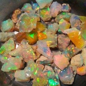 ATOZ SHOPPING Amazing Quality Natural Ethiopian Opal Rough Lot 1 Piece (1.00ct,3.00ct,5.00ct,) Amazing Multi Fire Welo Fire Opal Rough Untreated Rough Raw Gemstone, Black Opal Rough (mix fire 5 carat)