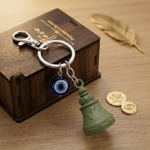 Image of OTTAVO Premium Guardian Bell Keychain for Bike & Car | Tibetan Texture Bell Keychain with Evil Eye & Silver Hook | Good Luck Charm with Laser-Engraved Wooden Gift Box