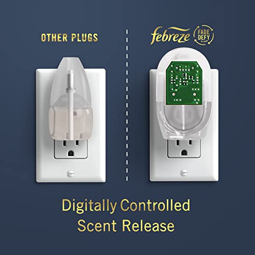 Image of Febreze Origins Fade Defy PLUG Air Freshener & Odor Fighter, Wood, (2) .87 fl. oz. Oil Refills Cranberry