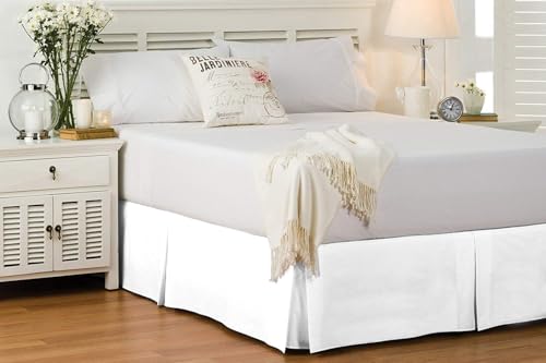 White split-corner cotton King bed skirt on a large bed — shows the tailored fit around a standard King frame