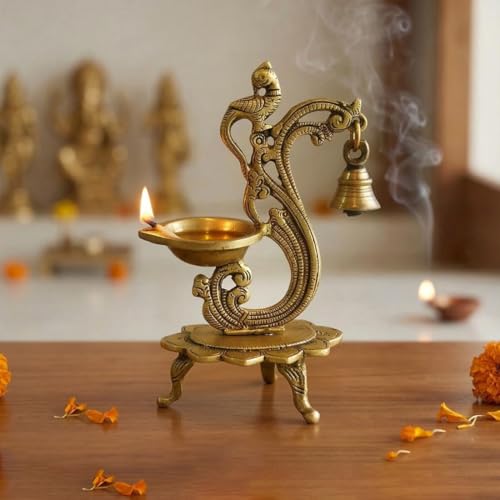 Image of ExclusiveLane 'Sacred Peacock' Brass Table Diya with Bell (100% Pure Brass, 1 Wick, 19.6 Cm, 20 ml, 0.64 kg, Hand-Etched) | Brass Diya for Pooja Traditional Decorative Diya for Pooja