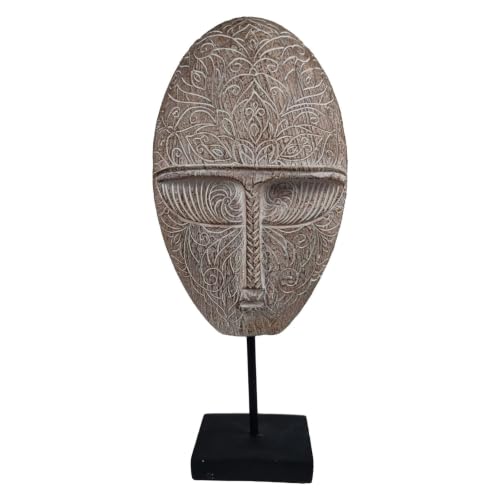 Máscara tribal conceptual con relieve de rostro humano y adorno de ojos grandes 2