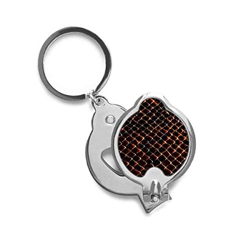 Coupe-ongles noir foncé peau de serpent pour trousse de voyage