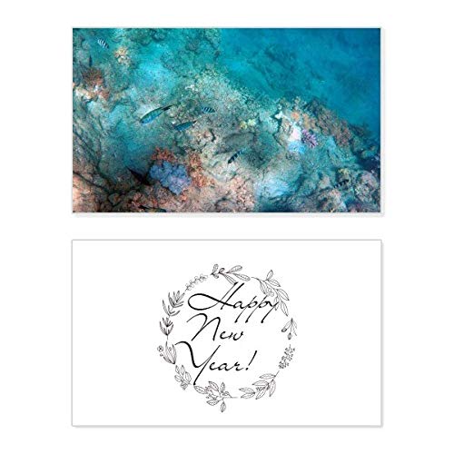 Tarjeta conmemorativa de Año Nuevo para enviar un mensaje de bendición del océano