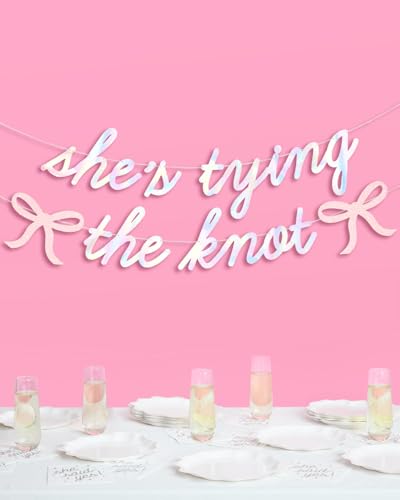 Image of xo, Fetti She's Tying the Knot Banner - Iridescent Foil | 4.5 Ft. | Bow Bachelorette Decorations, Engagement Party Sign, Proposal Background, Bach Supplies