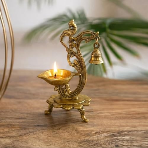 Image of ExclusiveLane 'Sacred Peacock' Brass Table Diya with Bell (100% Pure Brass, 1 Wick, 19.6 Cm, 20 ml, 0.64 kg, Hand-Etched) | Brass Diya for Pooja Traditional Decorative Diya for Pooja